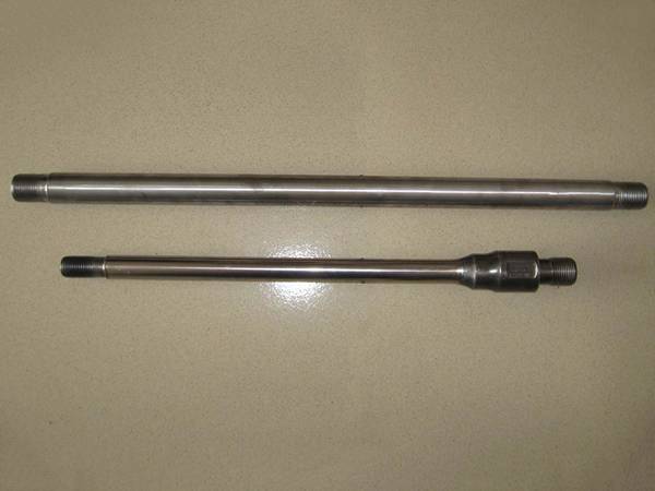 A piece of regular polished rod and a piece of end upsetting polished rod.