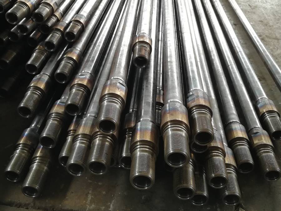 Several sucker rod on the working platform.