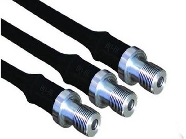 Three pieces of Grade H sucker rod on the white background.
